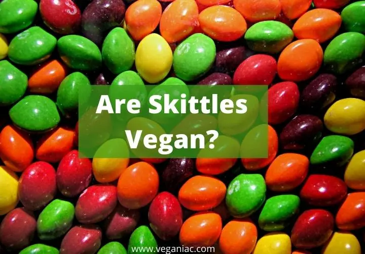 A scattered handful of rainbow-coloured Skittles sweets