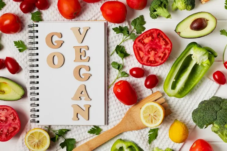 An assortment of delicious vegan meals emphasising a nutritious lifestyle, featuring greens, grains, and plant-based ingredients.