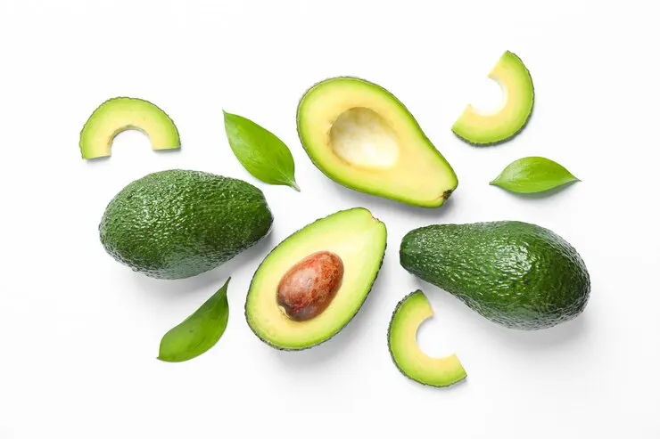 A fresh avocado displayed against a white background, emphasising its use as an excellent vegan baking alternative.