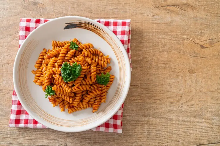 Spiral spirali pasta with tomato sauce parsley italian food style