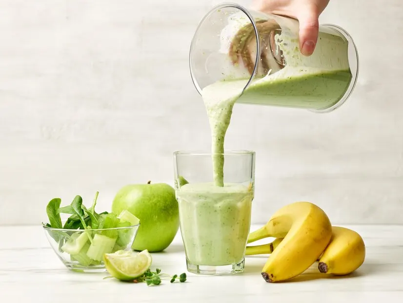 Summer pistachio smoothie, showcasing a blend of fresh fruits and vegetables in a vibrant green colour.
