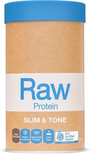 A cylindrical container of plant-based protein powder labeled "Slim & Tone" with a blue lid. Claims include "Triple Chocolate," "Vegan, Fermented," "70% Sprouted Protein," "Low Carb," and "ACO Certified Organic." This low-carb protein delight holds 500g.