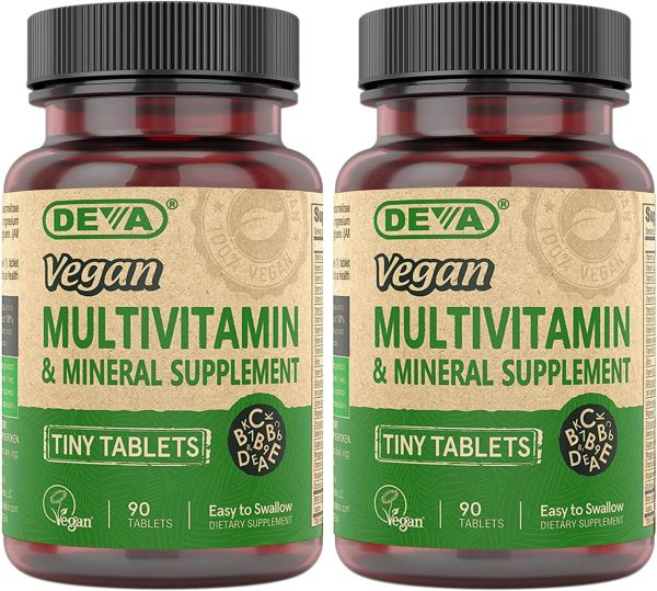 DEVA Tiny Tablets Vegan Multivitamins for Women & Men Two bottles of Deva Vegan Multivitamin & Mineral Supplement are displayed. The labels emphasize they are tiny, easy-to-swallow tablets, with 90 tablets per bottle. Suitable for both women and men, these vegan multivitamins proudly highlight their plant-based ingredients.