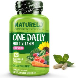 A green bottle labeled "Naturelo One Daily Multivitamin for Women" holds 120 vegetarian capsules, a true whole food supplement. The label showcases vibrant images of sunflower, vegetables, and berries. Two capsules and mint leaves elegantly rest in front, promoting energy support for women.