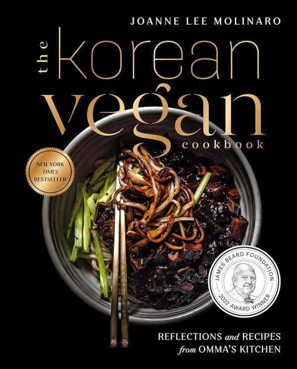 The-Korean-Vegan-Cookbook.jpg Cover of "The Korean Vegan Cookbook" by Joanne Lee Molinaro, featuring a bowl of noodles with scallions and mushrooms, chopsticks, and award seals noting "New York Times Bestseller" and "James Beard Foundation 2022 Award Winner," showcasing its import placeholder in the culinary world.
