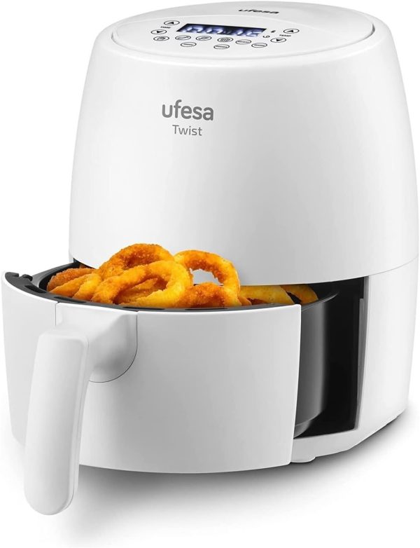 Ufesa Twist Fryer Hot Air Fryer, 2 L, Airfryer The white Ufesa Twist Airfryer, featuring a sleek digital display, sits with its basket open to reveal a crispy batch of cooked onion rings.