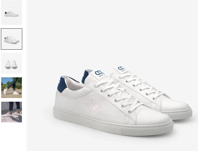 A white sneaker featuring blue laces and a blue logo, labeled as Winton Unisex Vegan Sneakers by COG.