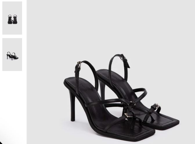 A pair of black high-heeled sandals with straps, featuring Vicki Vegan Olive Leather by PREV.