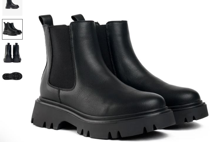 A pair of black leather Chelsea boots featuring a zipper, labeled as the Russ Vegan Chelsea Boots by V.GAN.