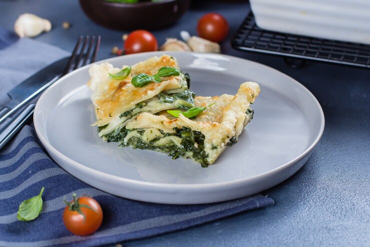 A delicious Lasagna Verde served on a plate, perfect for a romantic Valentine's Day meal.