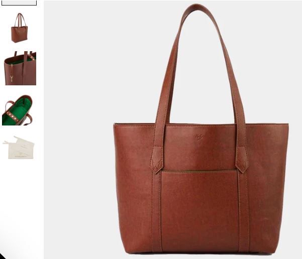 A brown leather tote bag featuring a green handle, labeled as Maddox Vegan Leather Tote Bag in Rust & Emerald.
