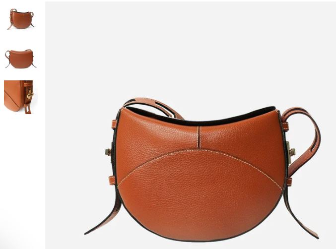 A brown leather purse with a small handle, featuring the Twist Women's MIRUM® Vegan Crossbody Bag in classic Tan.