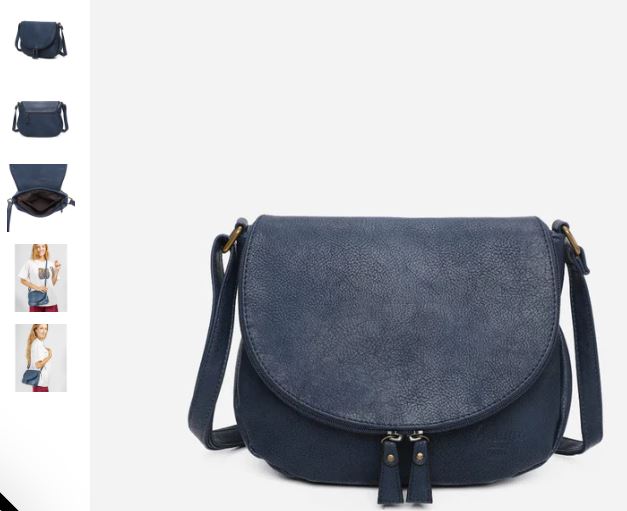 A blue leather crossbody bag displayed with various items, showcasing the Original Vegan Leather Shoulder Bag by Arsayo.