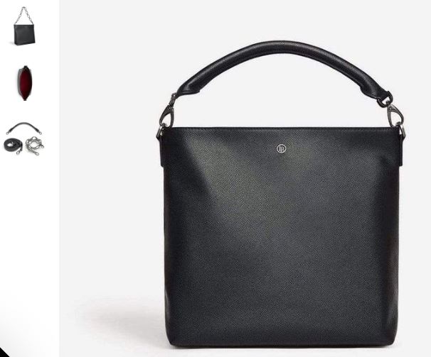 A black vegan leather hobo bag with a zipper and keychain, showcasing elegance and style by LaBante London.