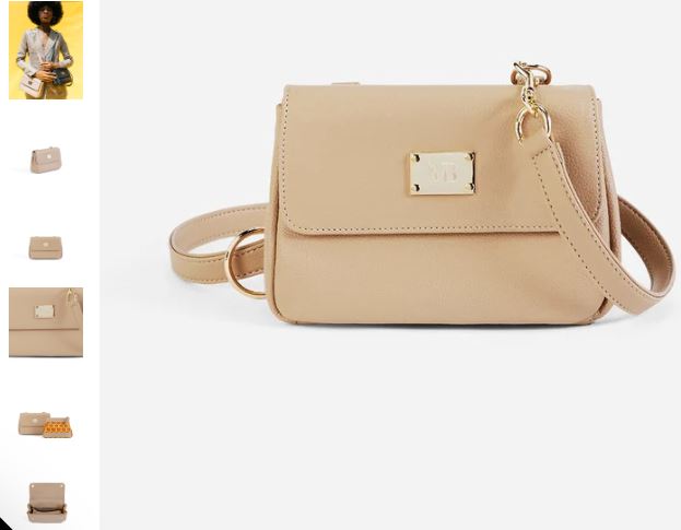 A beige vegan leather crossbody clutch bag with a gold chain, designed by Melina Bucher, showcasing elegance and versatility.