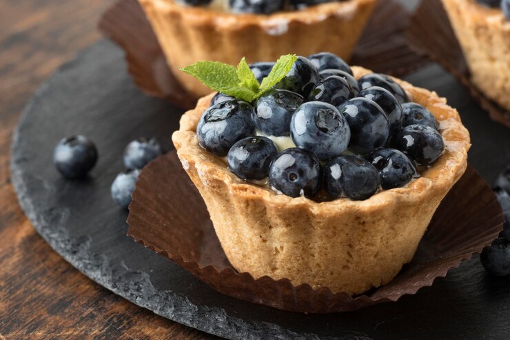 A charming blueberry tart with cream cheese and blueberries, ideal for celebrating love on Valentine's Day.