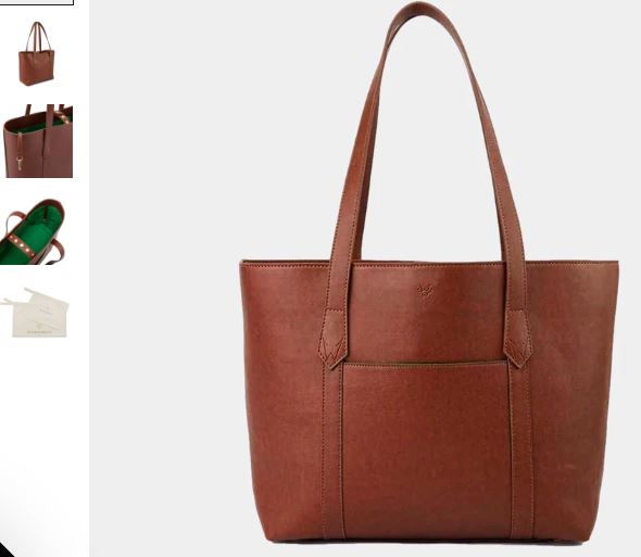  A brown leather tote bag featuring a green handle, showcasing the Maddox Vegan Leather Tote by Watson & Wolfe.