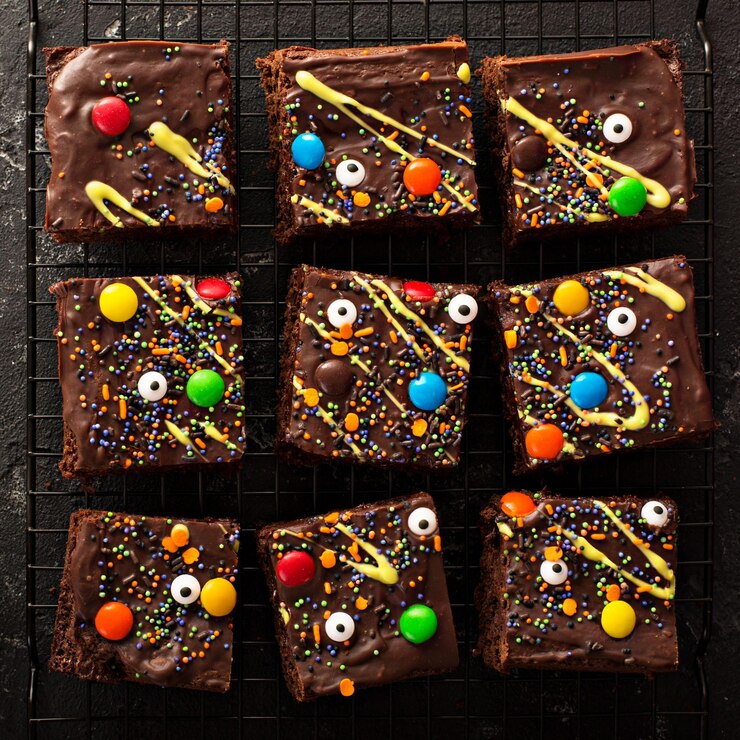 Best Cosmic Brownies: Vegan Twist on a Nostalgic Treat Vegan brownies topped with candy eyes and colorful sprinkles, inspired by nostalgic Cosmic Brownies.